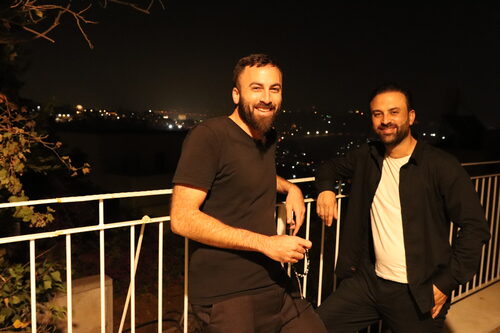 Marlene and Husam Abu Diab at an evening event overlooking Jerusalem